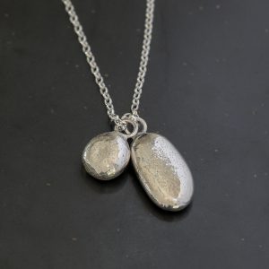Greenaway silver harmony pebble pendant, handmade in Cornwall by Chloe Michell.