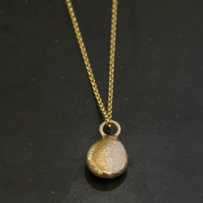 Greenaway pebble necklace in 9ct Gold, handmade in Cornwall by Chloe Michell.