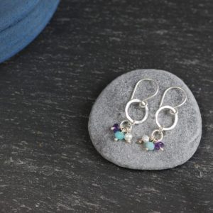 small hammered hoops with tiny appatite, amethyst and pearl beads made by chloe michell jewellery