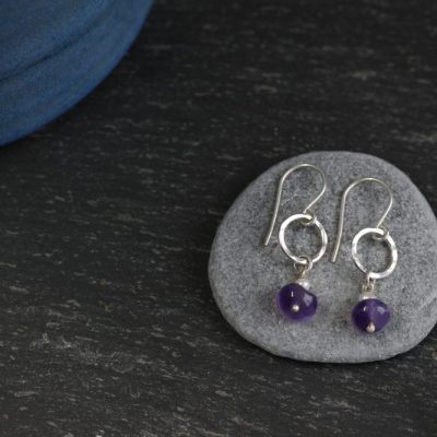 Pearl and amethyst on hammered sterling silver small hoops made by chloe michell jewellery