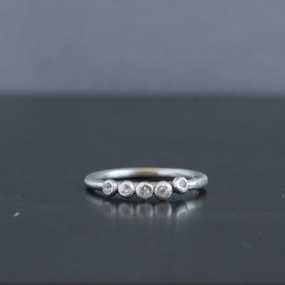 Tiny treasures white sapphire ring in silver. Handmade in Cornwall, by Chloe Michell.